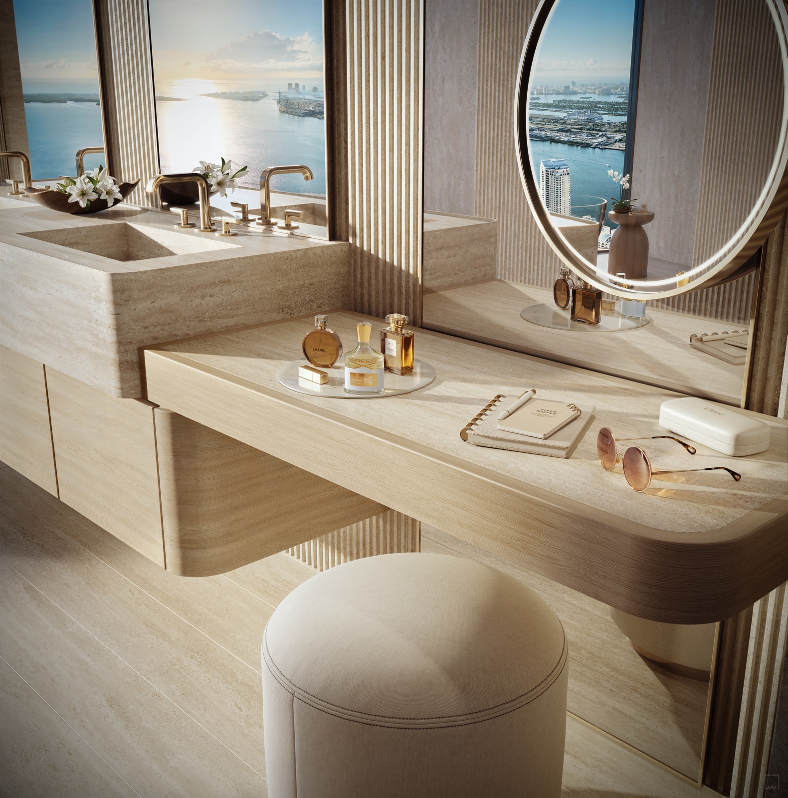 Primary bathroom with split vanities, sculptural bathtub, and refined natural materials.