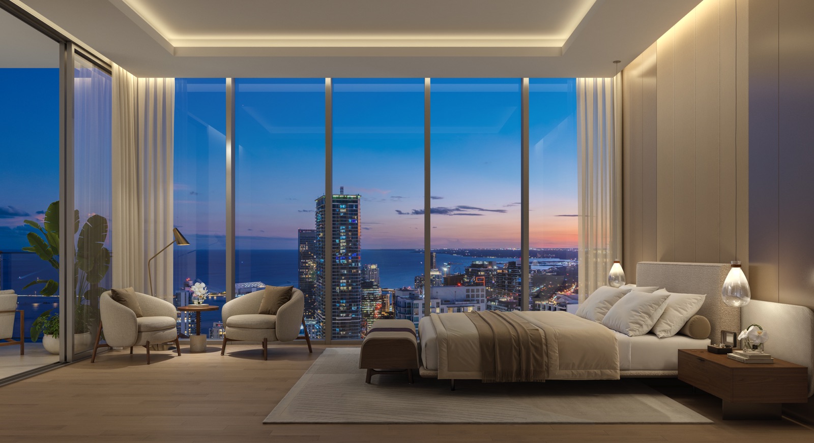 Primary bedroom with floor-to-ceiling glass and panoramic water views.
